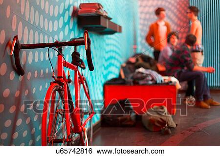 Bicycle in foreground, group of four teenage boys in background View Large Photo Image Stock Photograph - Bicycle in foreground, group of four teenage boys in background. Fotosearch