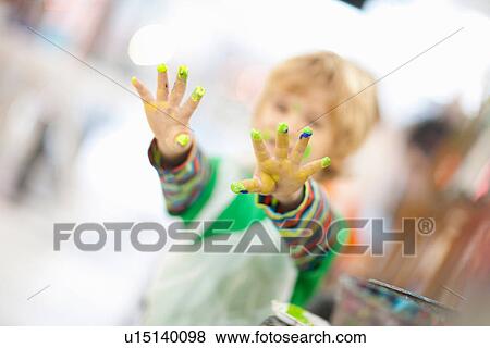 Boy with paint on his hands View Large Photo Image Stock Photo - Boy with paint on his hands. Fotosearch