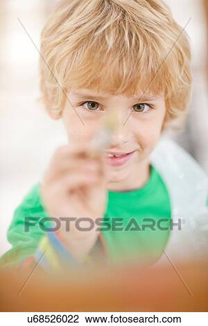 Boy with paintbrush View Large Photo Image Stock Image - Boy with paintbrush. Fotosearch
