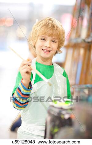 Boy with paintbrush View Large Photo Image Stock Photo - Boy with paintbrush. Fotosearch