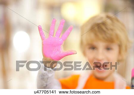 Boy with pink paint on his hand View Large Photo Image Stock Image - Boy with pink paint on his hand. Fotosearch