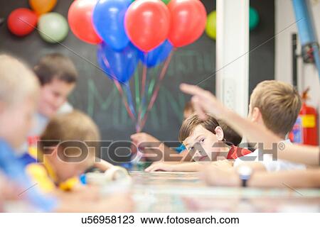 Boys at children's birthday party View Large Photo Image Stock Image - Boys at children's birthday party. Fotosearch