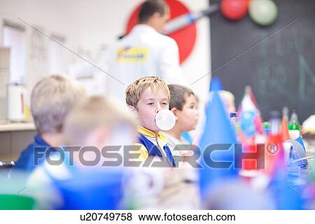 Boys at children's birthday party View Large Photo Image Stock Photo - Boys at children's birthday party. Fotosearch