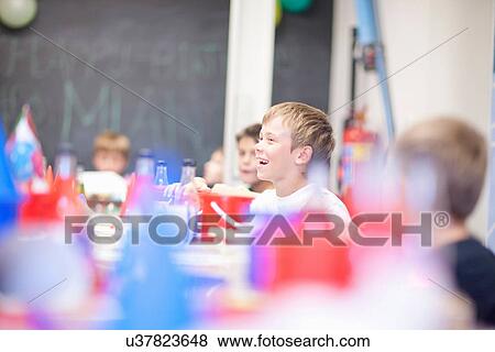 Stock Photo - Boys at party. Fotosearch