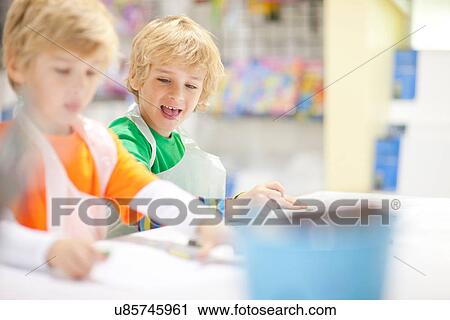 Boys drawing View Large Photo Image Stock Image - Boys drawing. Fotosearch