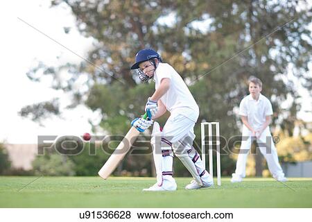 Boys playing cricket View Large Photo Image Stock Photo - Boys playing cricket. Fotosearch
