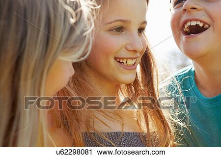 Stock Image - Children laughing. Fotosearch