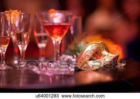 Cocktails and mask on table, close up View Large Photo Image Stock Image - Cocktails and mask on table, close up. Fotosearch