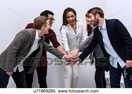 Stock Photography - Creative team celebrating success. Fotosearch
