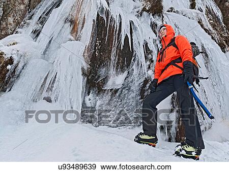 Female climber in front of frozen waterfall, Tryfan, Ogwen Valley, Snowdonia View Large Photo Image Stock Photo - Female climber in front of frozen waterfall, Tryfan, Ogwen Valley, Snowdonia. Fotosearch