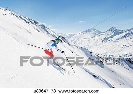 Female skier in action View Large Photo Image Stock Photo - Female skier in action. Fotosearch