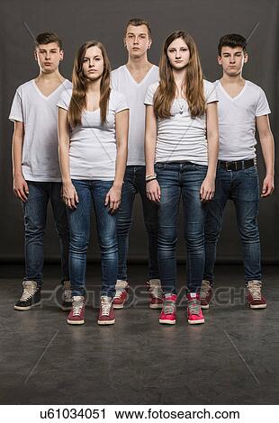 Five teenagers standing in a group View Large Photo Image Stock Image - Five teenagers standing in a group. Fotosearch