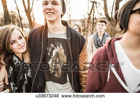 Five teenagers walking together View Large Photo Image Stock Photo - Five teenagers walking together. Fotosearch