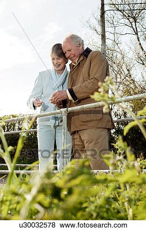 Husband and wife spending time together View Large Photo Image Stock Photo - Husband and wife spending time together. Fotosearch