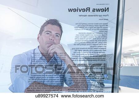 Journalist and blogger reading news, view through screen View Large Photo Image Picture - Journalist and blogger reading news, view through screen. Fotosearch