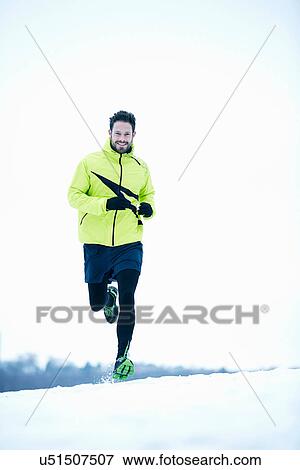 Man snow running View Large Photo Image Stock Photo - Man snow running. Fotosearch
