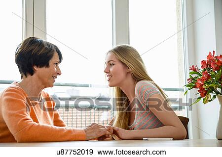 Mother and daughter talking face to face View Large Photo Image Stock Photo - Mother and daughter talking face to face. Fotosearch