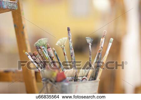 Paintbrushes in pot View Large Photo Image Picture - Paintbrushes in pot. Fotosearch