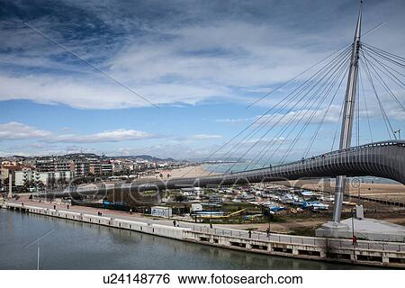 Pedestrian bridge over water in Pescara, Abruzzo, Italy View Large Photo Image Stock Photograph - Pedestrian bridge over water in Pescara, Abruzzo, Italy. Fotosearch