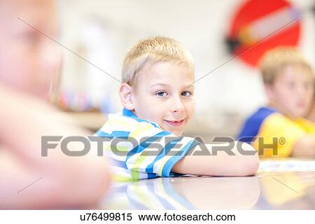 Portrait of blonde boy looking at camera View Large Photo Image Stock Photography - Portrait of blonde boy looking at camera. Fotosearch