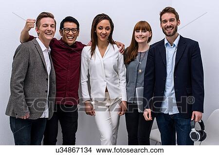 Picture - Portrait of creative team celebrating success. Fotosearch