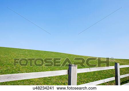 Wooden fence on plain landscape View Large Photo Image Stock Image - Wooden fence on plain landscape. Fotosearch