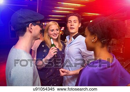 Young people in nightclub View Large Photo Image Stock Photography - Young people in nightclub. Fotosearch