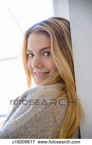 Young woman with blonde hair, portrait View Large Photo Image Stock Photo - Young woman with blonde hair, portrait. Fotosearch