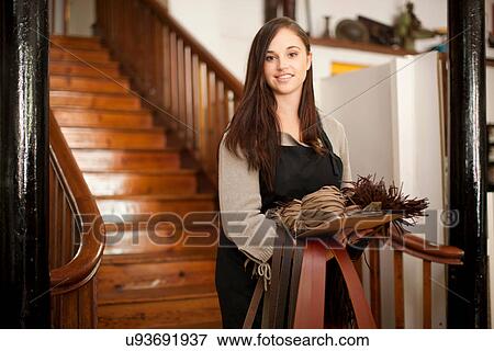 Young woman with samples in leather shop View Large Photo Image Stock Photo - Young woman with samples in leather shop. Fotosearch