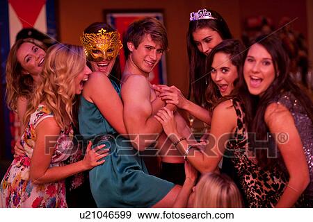 Stock Photo - Young women at hen party with male stripper. Fotosearch