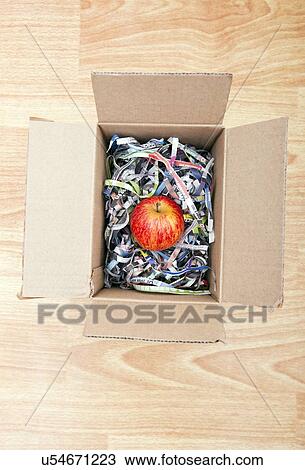 Apple wrapped up in a box View Large Photo Image Stock Image - Apple wrapped up in a box. Fotosearch