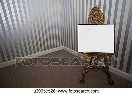 Stock Photograph - Blank sign board on easel. Fotosearch