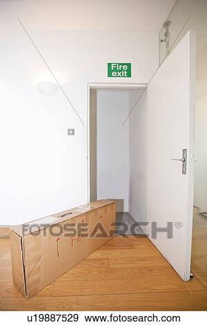 Cardboard box marked "fragile" by fire exit View Large Photo Image Stock Photo - Cardboard box marked "fragile" by fire exit. Fotosearch