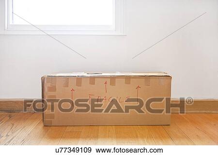 Cardboard box marked "fragile" View Large Photo Image Stock Photo - Cardboard box marked "fragile". Fotosearch