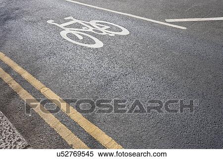 Stock Photography - Close-Up of cycle lane in the road . Fotosearch