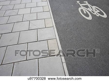 Stock Photo - Close-Up of cycle lane on the pavement. Fotosearch