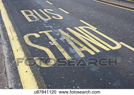 Stock Image - Close-Up of road marking saying Bus Stand in London, UK. Fotosearch