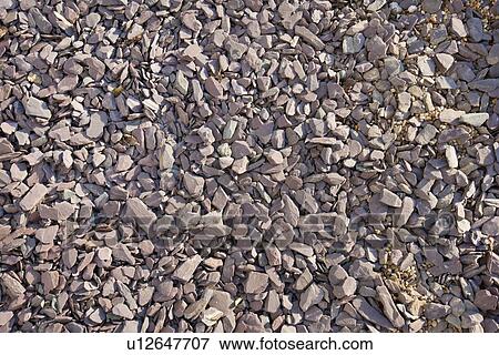 Stock Photo - Close-up view of mixed gravel and slate stones. Fotosearch