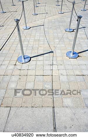 Close-Up view of Stanchions marking out queue View Large Photo Image Stock Image - Close-Up view of Stanchions marking out queue. Fotosearch