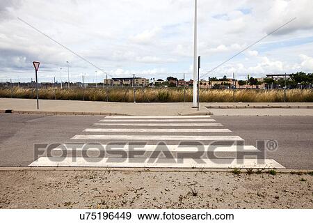 Stock Photo - Pedestrian crossing in abandoned housing estate building site, Valencia region, Spain. Fotosearch
