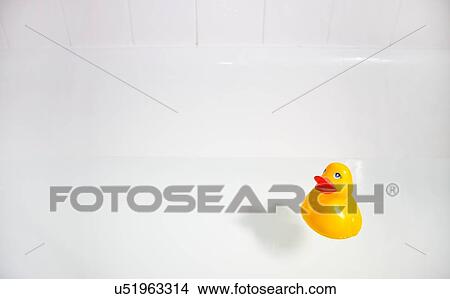 Rubber duck in bathtub View Large Photo Image Picture - Rubber duck in bathtub. Fotosearch