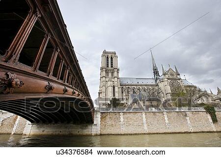 Picture - Side View of Notre Dame and Seine River. Fotosearch