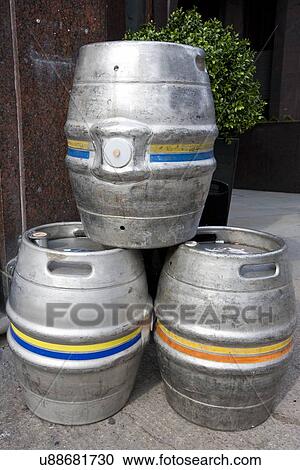 Three empty metal kegs outside a bar View Large Photo Image Stock Image - Three empty metal kegs outside a bar. Fotosearch