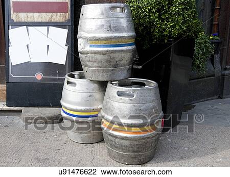 Three empty metal kegs outside a bar View Large Photo Image Stock Image - Three empty metal kegs outside a bar. Fotosearch