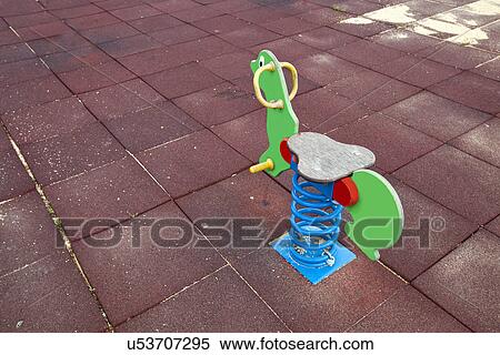 Stock Photography - Toy horse in childrens playground, Valencia region, Spain. Fotosearch
