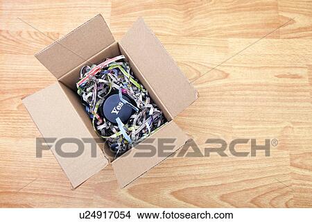 Picture - Wooden block with the word Yes wrapped in a box. Fotosearch