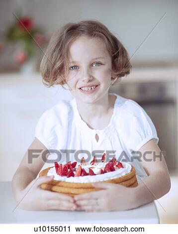 Young girl with cake View Large Photo Image Stock Image - Young girl with cake. Fotosearch
