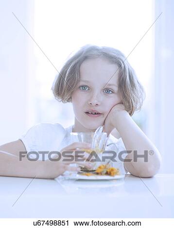 Young girl with tea cup View Large Photo Image Stock Image - Young girl with tea cup. Fotosearch