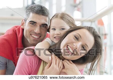 Young happy family in shopping mall View Large Photo Image Stock Photography - Young happy family in shopping mall. Fotosearch