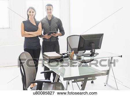 Business people in office View Large Photo Image Stock Photo - Business people in office. Fotosearch